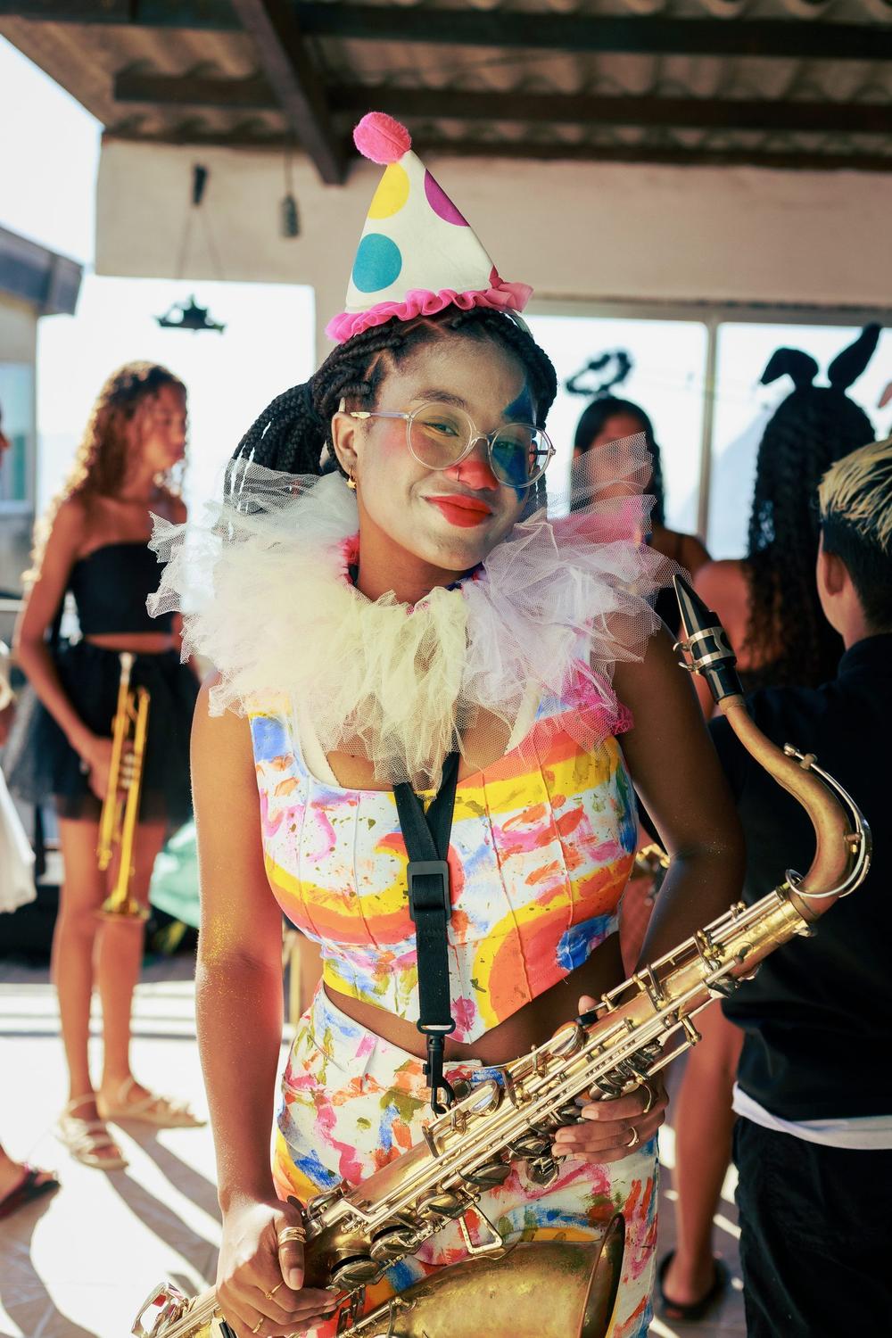 Saxophonist in costume during the Carnaval procession