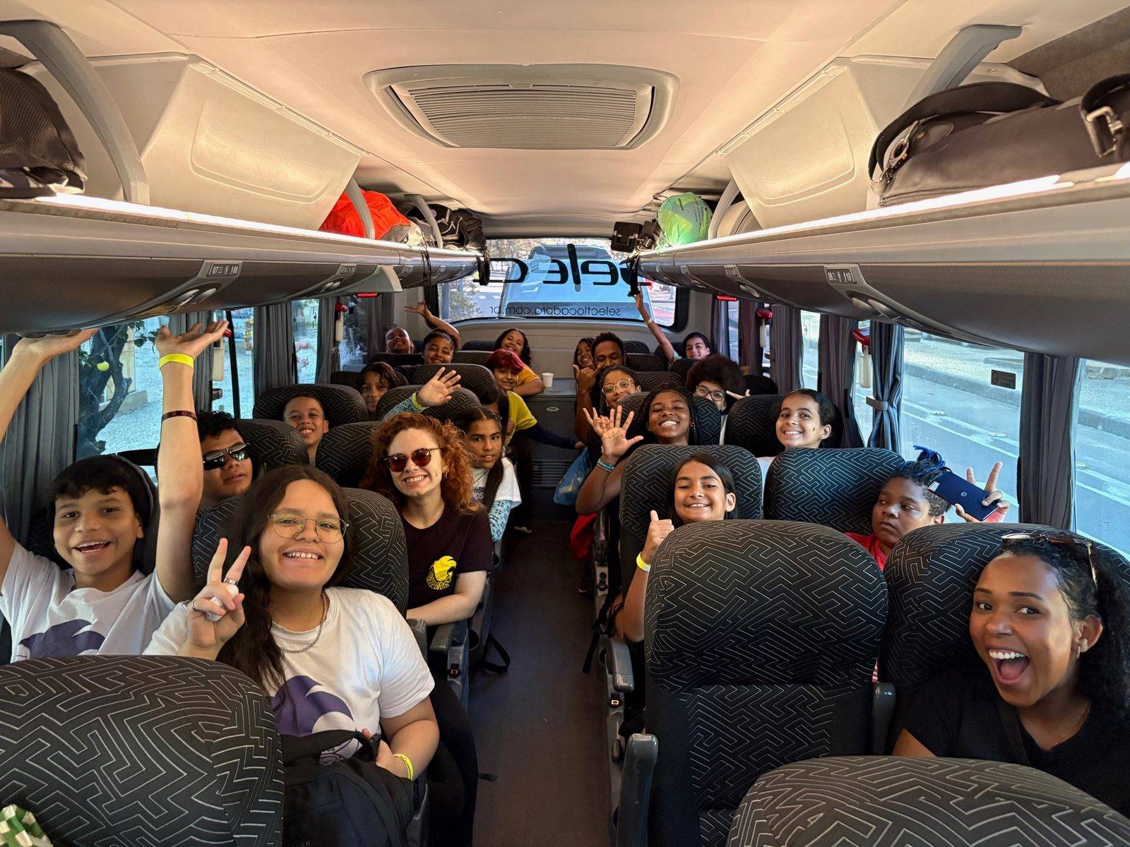 Students on the bus to Itaipava